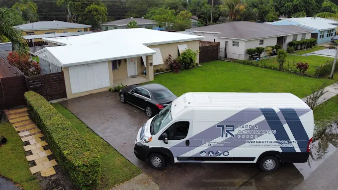 Restoration Geeks marked van parked at a customer's home